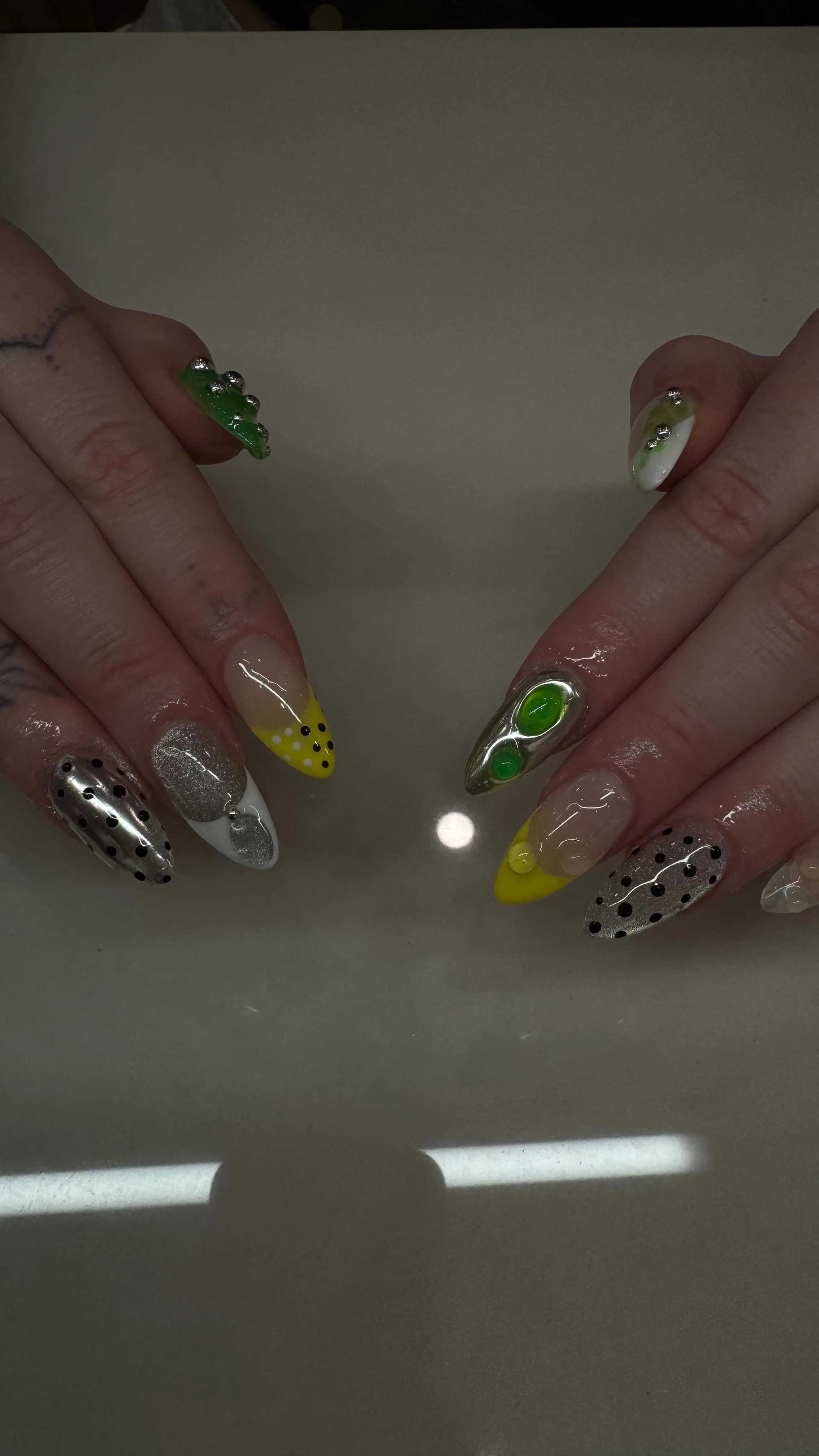Eclectic custom nail set with gem charms, chrome accents and hand-painted details