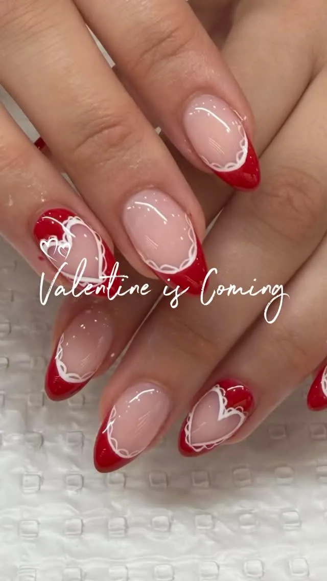 Red heart French tips — seasonal nail art